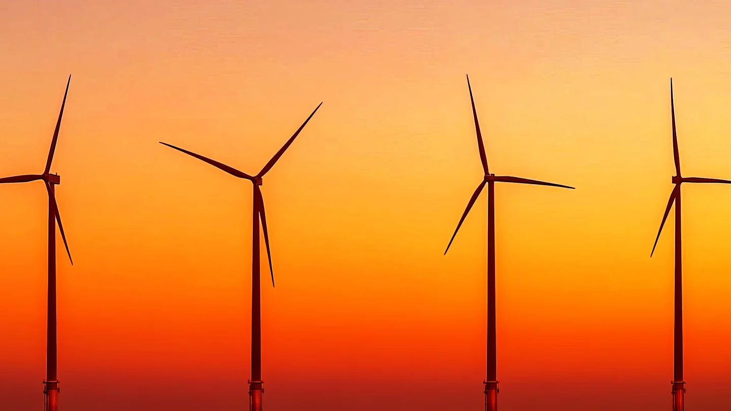 Wind turbines at sunset